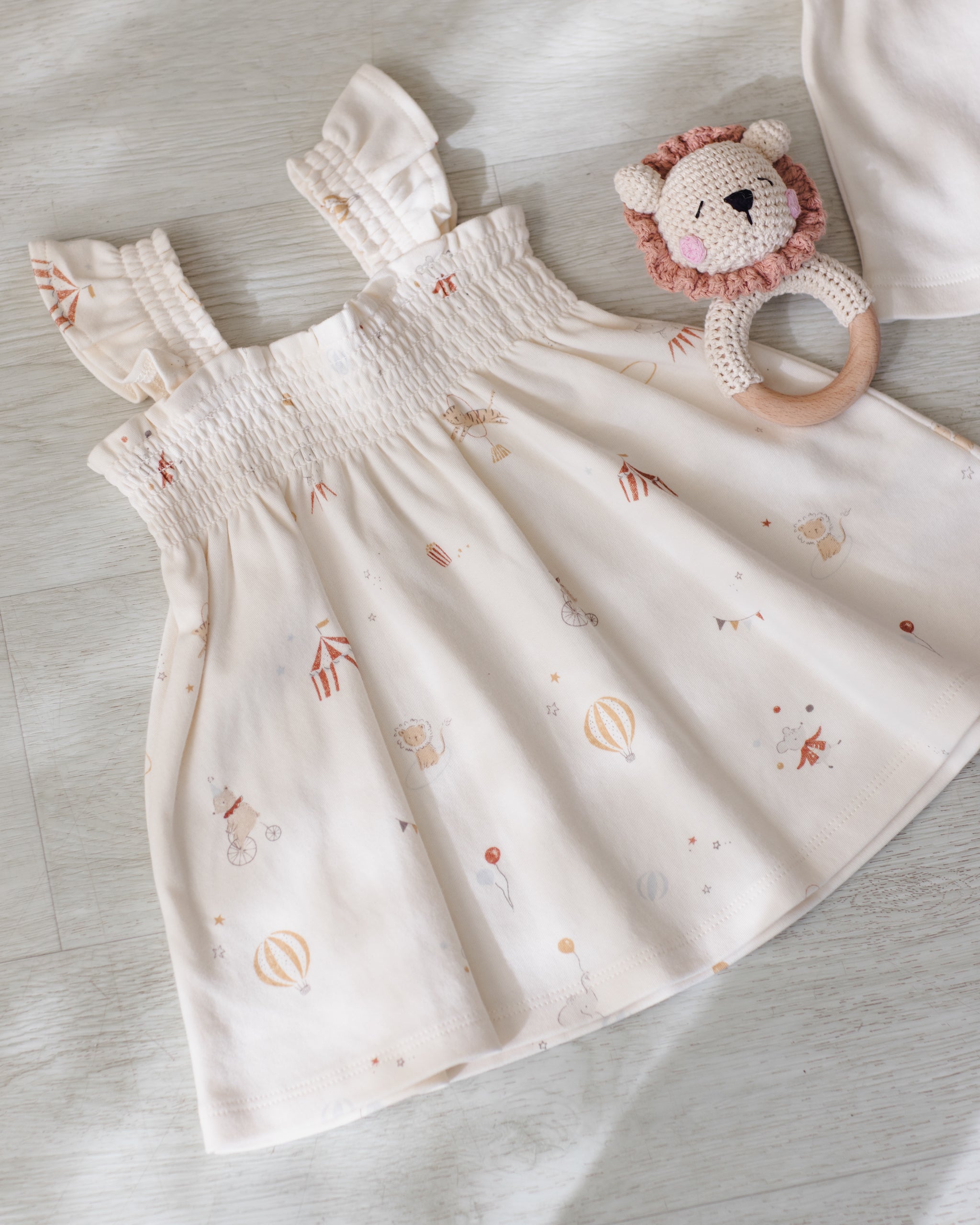 Smocked Jersey Dress Carnival - 0-3M Smocked Jersey Dress Carnival - 0-3M